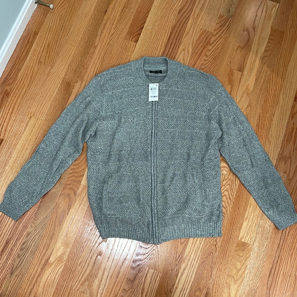 Men’s gray zip up sweater. Size large. New with tags
